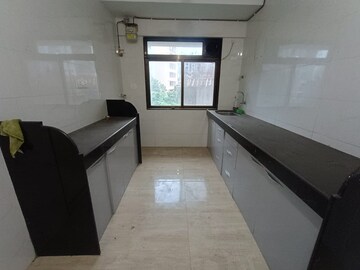 Kitchen in 3 BHK Apartment at Gitanjali Apartment Chembur, Chembur – for Rent