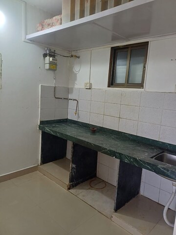 Kitchen in 1 BHK Apartment at Jaldhara Sra Chs, Goregaon East – for Rent