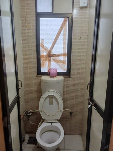 Bathroom in 1 BHK Apartment at Jaldhara Sra Chs, Goregaon East – for Rent