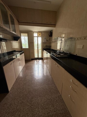 Kitchen in 2.5 BHK Apartment at Tarangan Towers, Samata Nagar – for Rent
