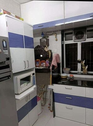 Kitchen in 1 BHK Apartment at Daya Sagar CHSL, Goregaon East – for Sale