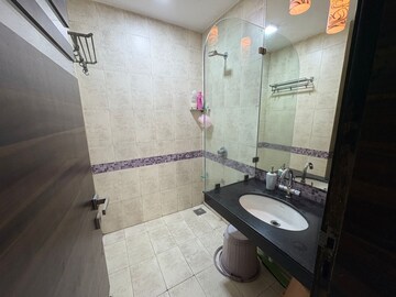 Bathroom in 3 BHK Apartment at Oberoi Realty Splendor, Andheri East – for Rent