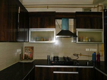 Kitchen in 3.5 BHK Apartment at Mahagun Mezzaria, Sector 78 – for Rent