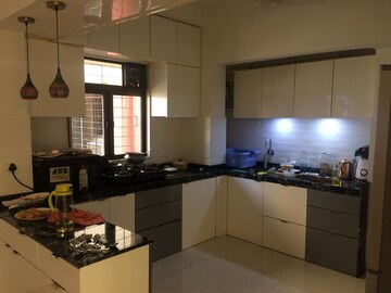 Kitchen in 3 BHK Apartment at Riddhi Gardens CHS, Malad East – for Rent