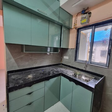 Kitchen in 1 BHK Apartment at Aman CHS Malad East, Pathan Wadi – for Rent
