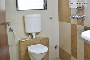 Bathroom in 2 BHK Apartment at Aplite Sapphire, Grant Road East – for Sale