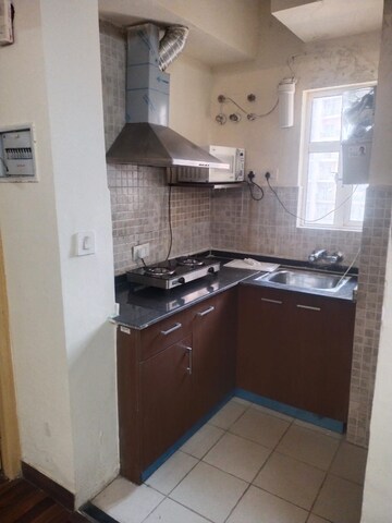 Kitchen in Studio Apartment at Paras Tierea, Sector 137 – for Rent