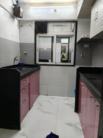 Kitchen in 3 BHK Apartment at DGS Sheetal Airwings, Santacruz East – for Rent