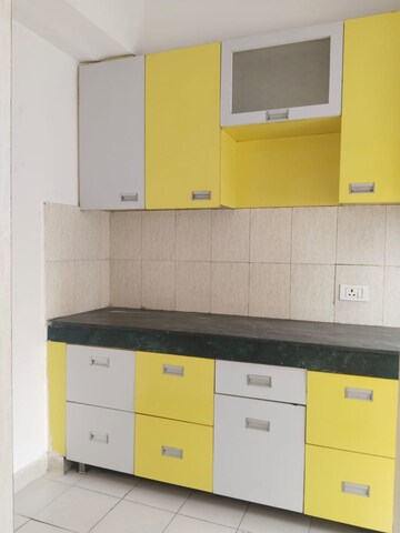 Kitchen in 2.5 BHK Apartment at Paras Tierea, Sector 137 – for Rent