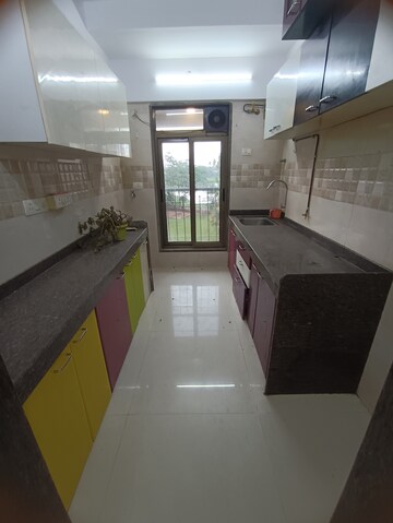 Kitchen in 1 BHK Apartment at Abrol Avirahi Heights, Malad West – for Sale