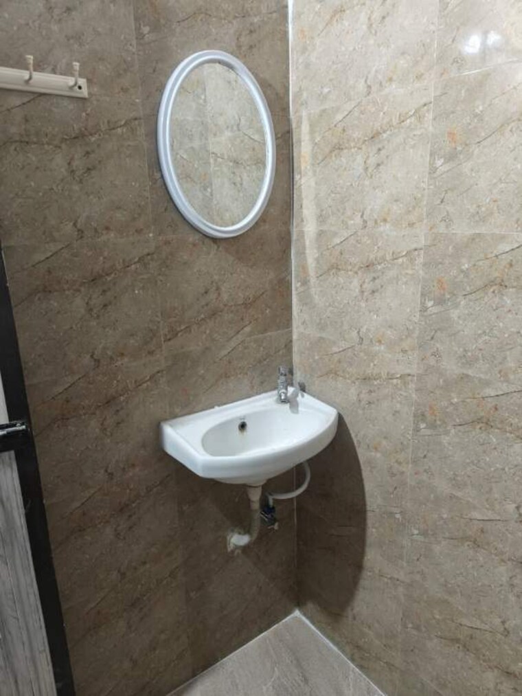 Bathroom, aangan-chs-ghansoli 2 Bedroom 944 Sq.Ft. Apartment In Ghansoli Navi Mumbai 9188063