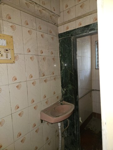 Bathroom in 2 BHK Apartment at Ulhasnagar – for Sale