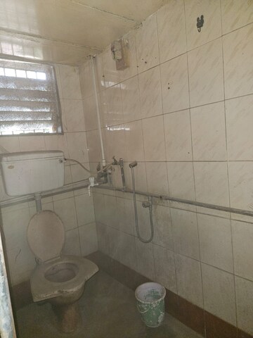 Bathroom in 2 BHK Apartment at Ulhasnagar – for Sale