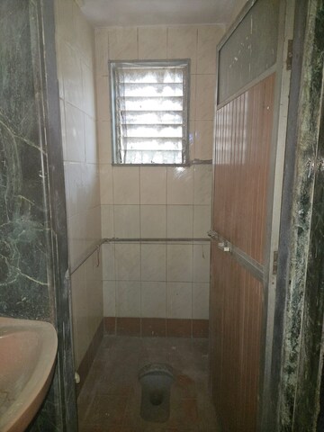 Bathroom in 2 BHK Apartment at Ulhasnagar – for Sale