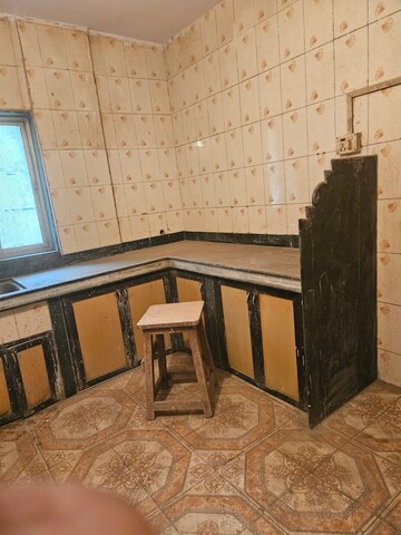 Kitchen in 2 BHK Apartment at Ulhasnagar – for Sale