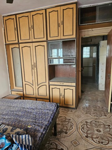 Bedroom in 2 BHK Apartment at Ulhasnagar – for Sale