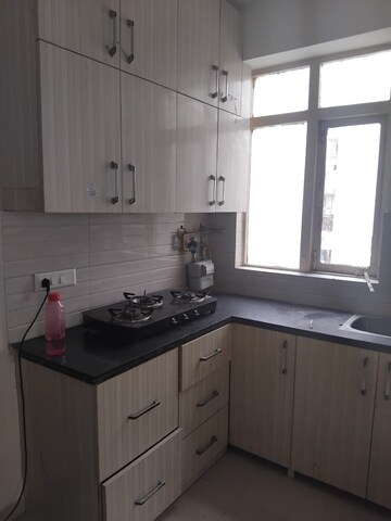 Kitchen in 1 BHK Apartment at Auric City Homes, Sector 82 – for Rent