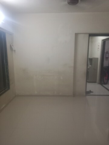 Living Room in 1 BHK Apartment at Shraddha Orchid Avenue, Bhandup West – for Rent