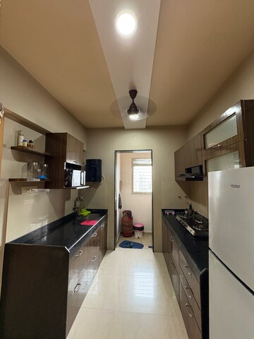 Kitchen in 2 BHK Apartment at Genevieve Casa Rio, Nilje Gaon – for Rent