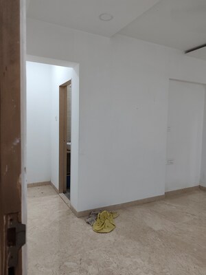 Room in 2 BHK Apartment at Rajvi Ashtavinayak, Andheri West – for Sale