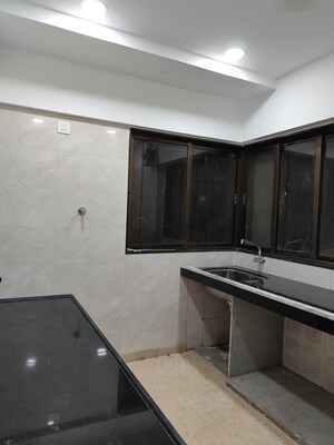Kitchen in 2 BHK Apartment at Rajvi Ashtavinayak, Andheri West – for Sale