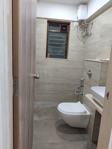 Bathroom in 2 BHK Apartment at Rajvi Ashtavinayak, Andheri West – for Sale
