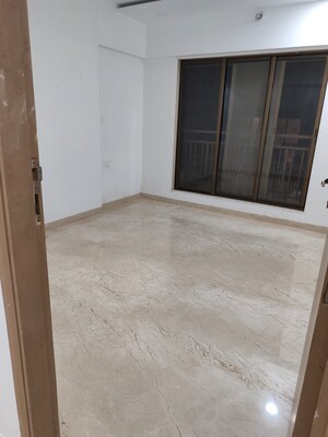 Room in 2 BHK Apartment at Rajvi Ashtavinayak, Andheri West – for Sale