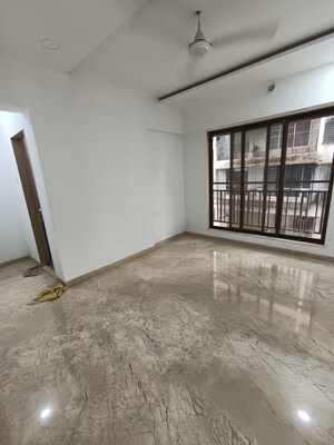 Room in 2 BHK Apartment at Rajvi Ashtavinayak, Andheri West – for Sale