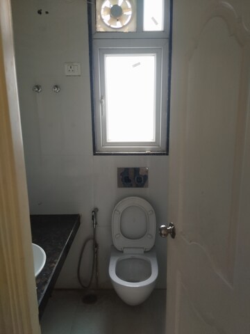 Bathroom in 2 BHK Apartment at Chandra Panorama, Sushant Golf City – for Rent