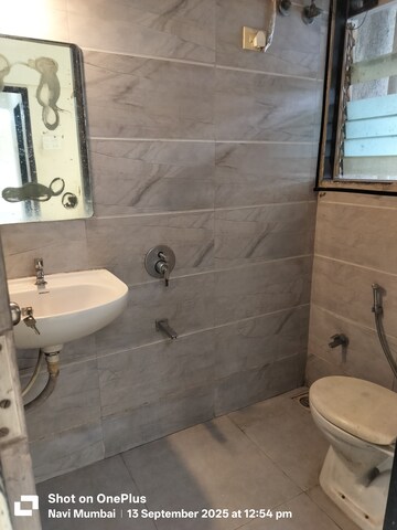 Bathroom in 2 BHK Apartment at Marvel Shanti Heights, Kopar Khairane – for Sale