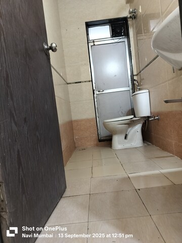 Bathroom in 2 BHK Apartment at Marvel Shanti Heights, Kopar Khairane – for Sale