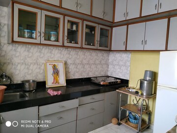 Kitchen in 2 BHK Apartment at Sun City, Sinhagad Road – for Sale