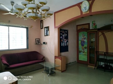 Living Room in 2 BHK Apartment at Sun City, Sinhagad Road – for Sale