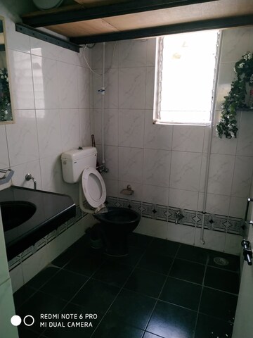 Bathroom in 2 BHK Apartment at Sun City, Sinhagad Road – for Rent