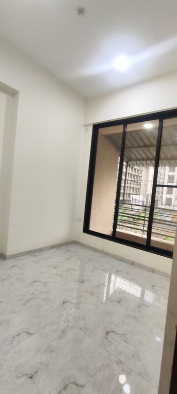 Room in 1 BHK Apartment at Shree Krishna Bhoomi, Naigaon East – for Sale