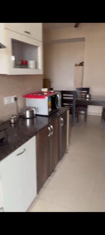 Kitchen in 3 BHK Apartment at Vasundhara Sector 18 – for Sale