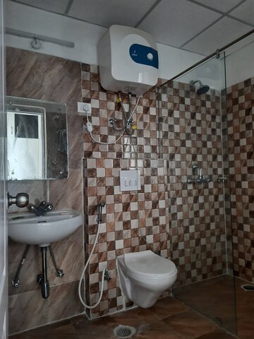Bathroom in 3 BHK Apartment at Ansal API Celebrity Gardens, Sushant Golf City – for Rent