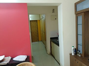 Living Room in 1 BHK Apartment at Greenwoods CHS, Andheri East – for Rent