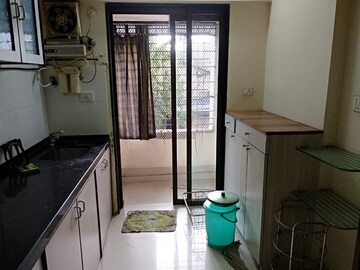 Kitchen in 1 BHK Apartment at Greenwoods CHS, Andheri East – for Rent