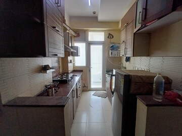 Kitchen in 3 BHK Apartment at Amrapali Platinum, Sector 119 – for Sale
