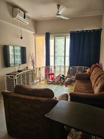 Living Room in 2 BHK Apartment at Rustomjee Azziano Wing D, Thane West – for Rent