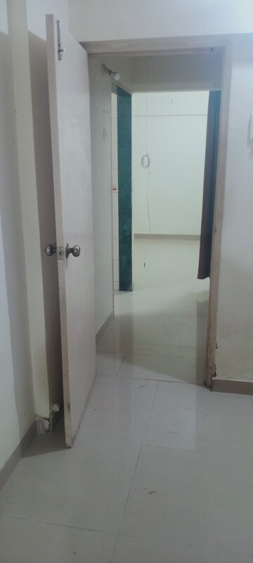 Building Lobby in 1 BHK Apartment at Bindra Orchid, Andheri East – for Rent