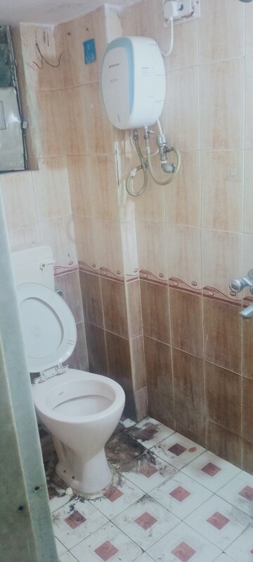 Bathroom in 1 BHK Apartment at Bindra Orchid, Andheri East – for Rent