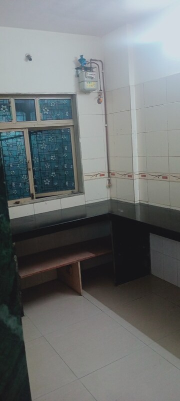Kitchen in 1 BHK Apartment at Bindra Orchid, Andheri East – for Rent