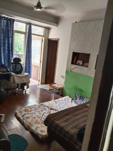 Living Room in 2 BHK Apartment at Mahagun Mascot, Sain Vihar – for Rent