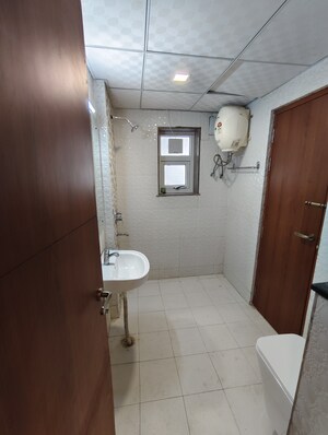 Bathroom in 3 BHK Apartment at Dwarka – for Rent