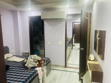 Bedroom in 2.5 BHK Builder Floor at Ansal Sushant Lok I, Sector 43 – for Rent