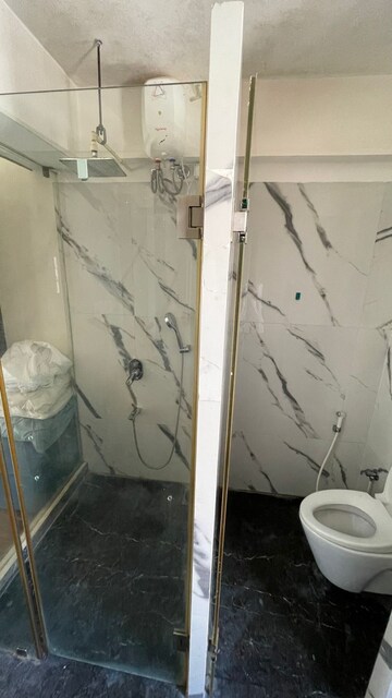 Bathroom in 2 BHK Apartment at Jaycee Bhagtani Elegance, Andheri West – for Sale