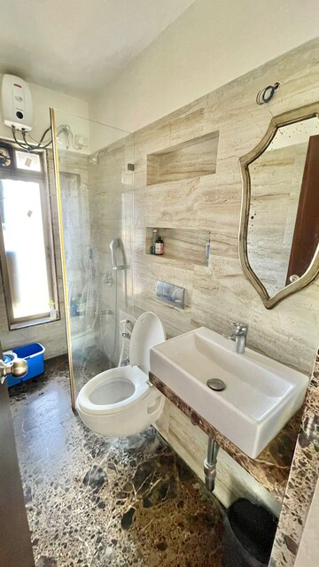 Bathroom in 2 BHK Apartment at Jaycee Bhagtani Elegance, Andheri West – for Sale