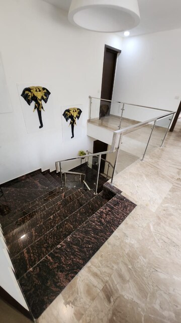 Staircase in 5 BHK Villa at Sainik Farm – for Sale